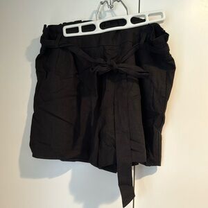 Paper bag black shorts.
